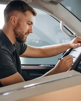 Maritime courier driver coordinating secure port delivery